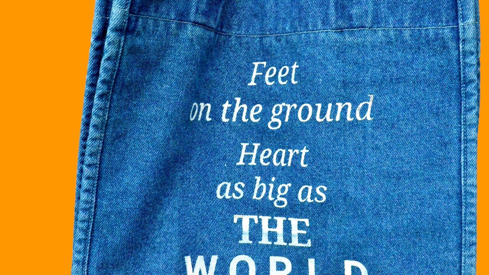 "Feet on the ground, Heart as big as the world" Light Blue Denim Tote bag