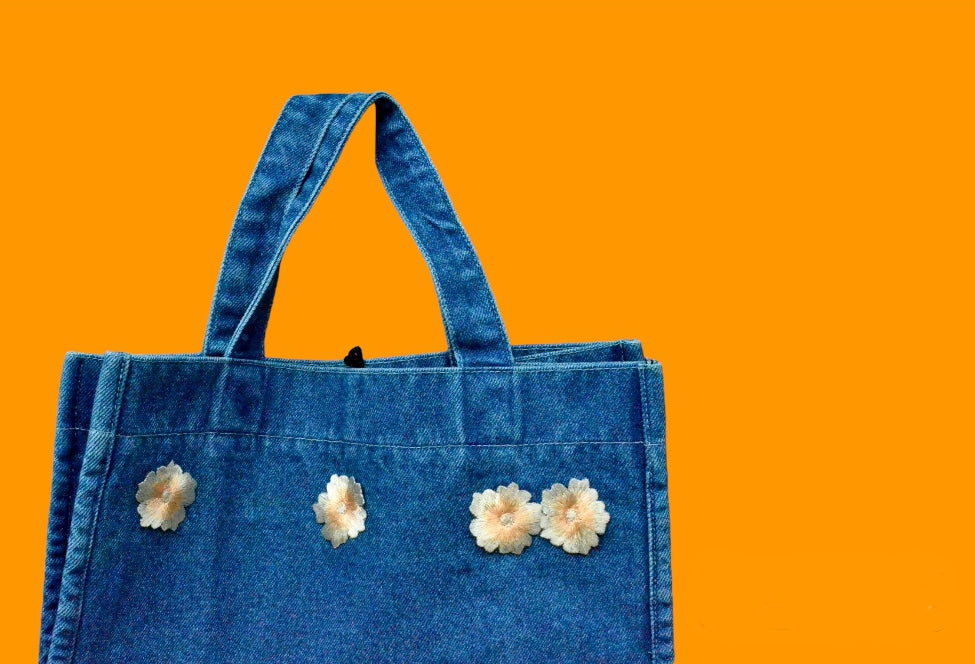 White embroidery blue denim tote bag details