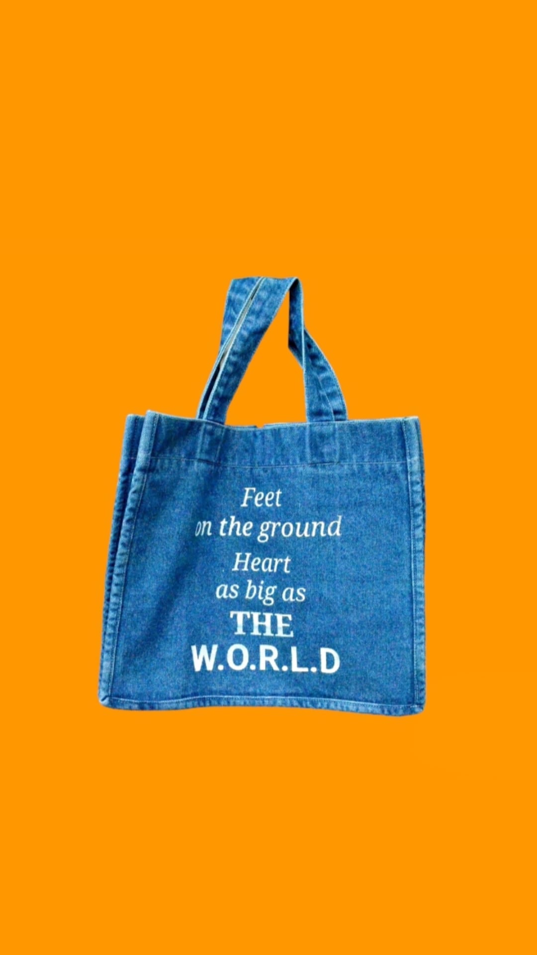 "Feet on the ground, Heart as big as the world" Light Blue Denim Tote bag