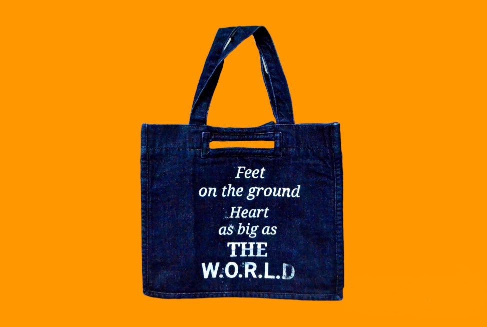 "Feet on the ground heart as big as the world " Dark Blue Denim Tote Bag