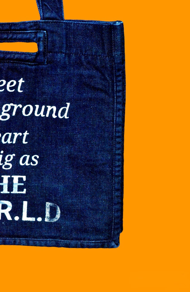 "Feet on the ground heart as big as the world " Dark Blue Denim Tote Bag